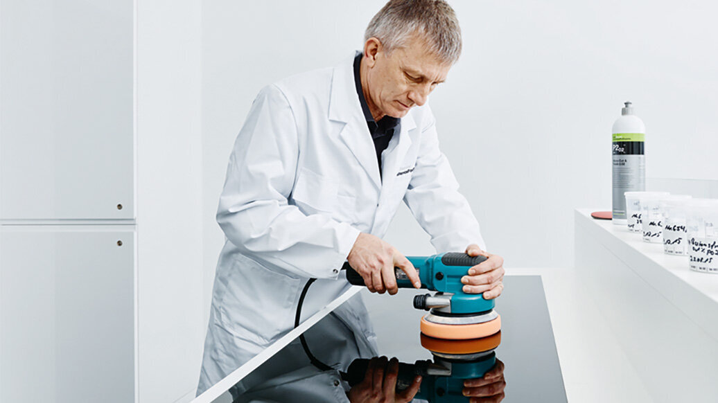 Engineer testing a Koch-Chemie product