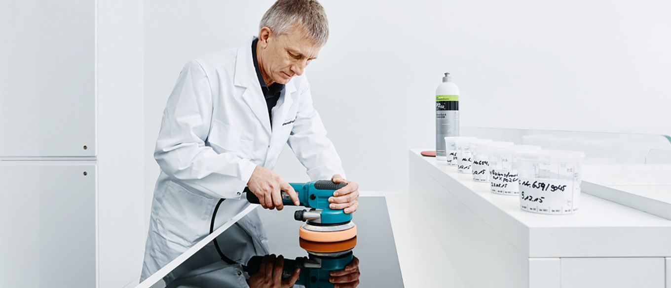 Engineer testing a Koch-Chemie product